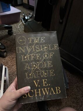 The Invisible Life of Addie LaRue — V. E. Schwab (Gold on Black Cover)